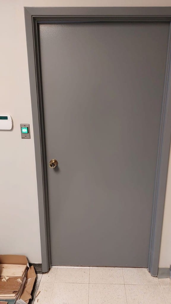 Commercial push-to-exit door entry Commercial security door with illuminated green Push to Exit button installed by Ultimate Security GTA in the Greater Toronto Area